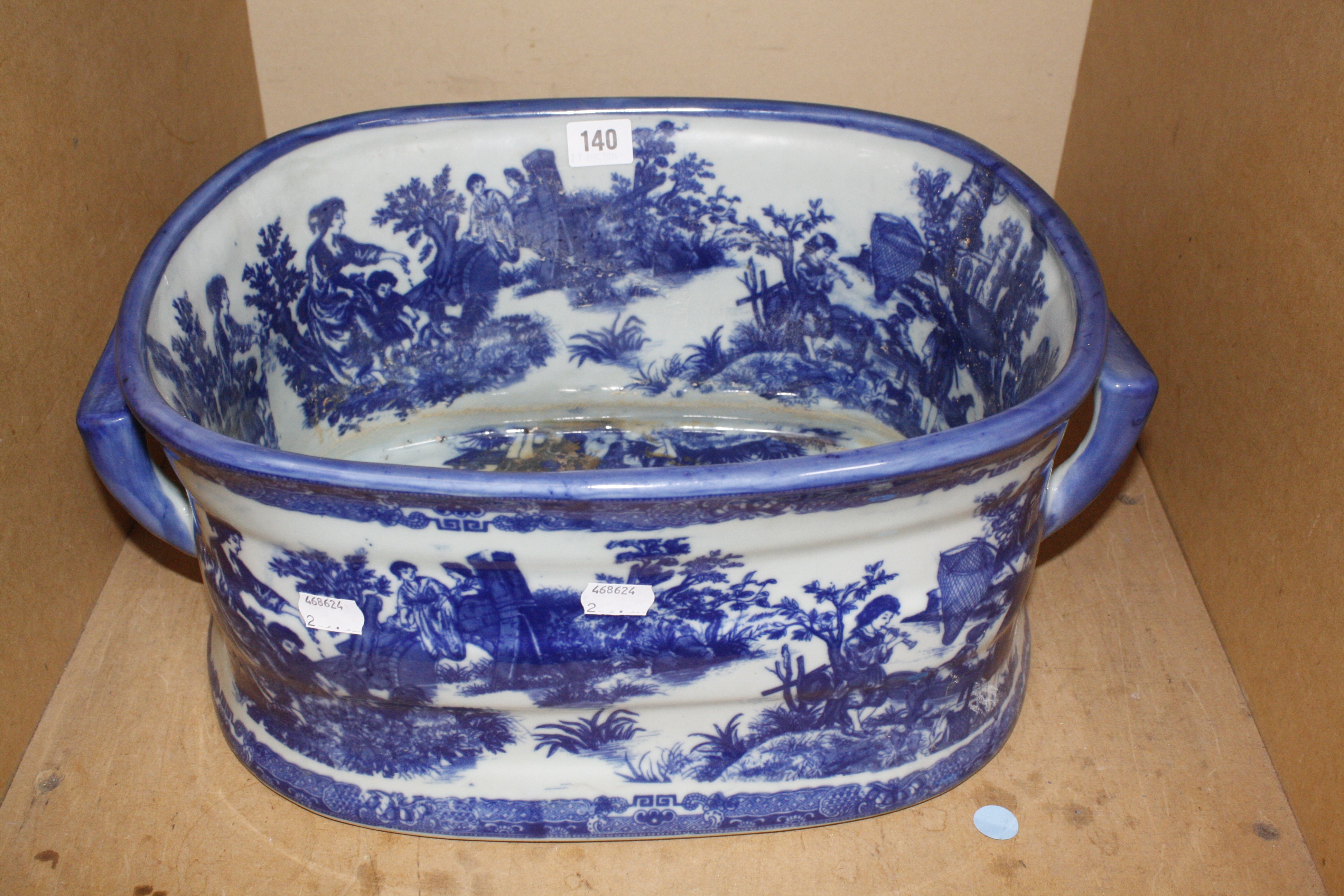 A Victorian blue and white two-handled foot bath, 20cm high