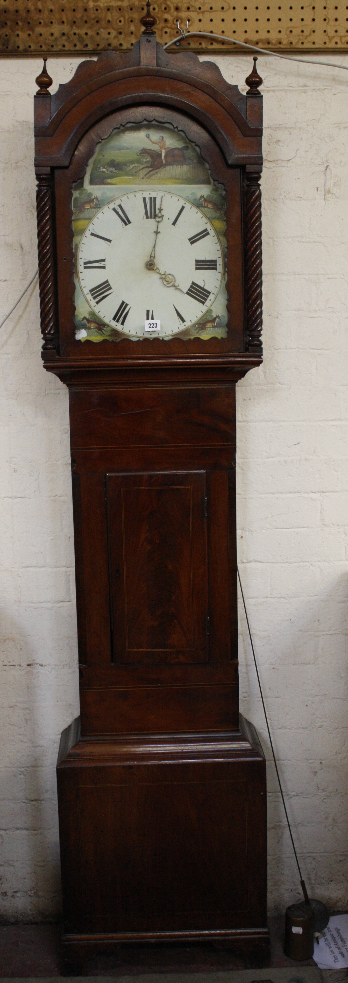 A 19th Century Mahogany longcase clock with Fox Hunting scenes to the face. 216cm high. - Image 2 of 2