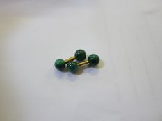A pair of 14K gold and malachite barbell ball cufflinks marked Tiffany