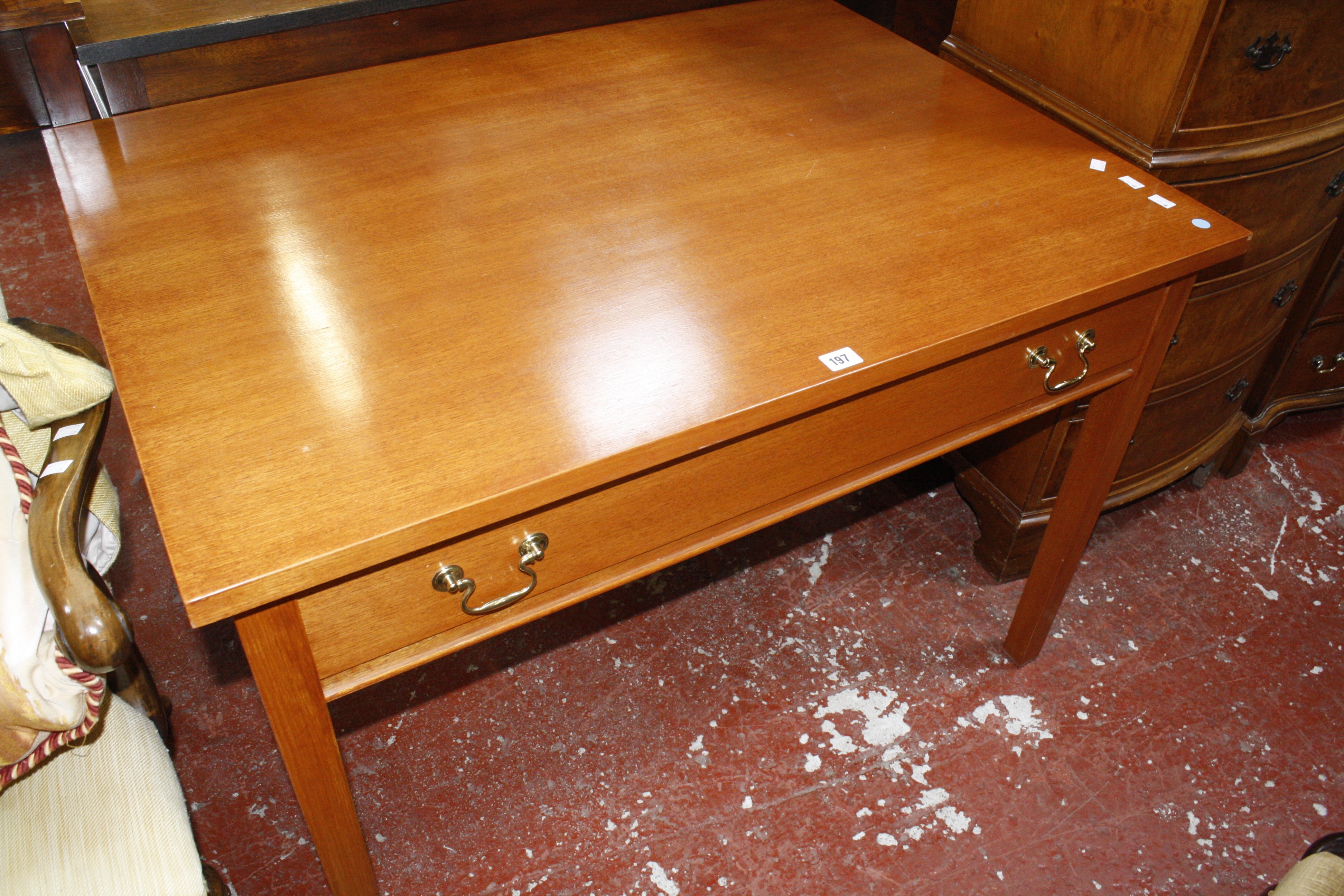 A modern stained beech finished side table with two frieze drawers. 108cm x 79cm