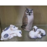 A Royal Copenhagen owl, 15cm high, two lambs sleeping, 5cm high and two pigs resting, 6cm high -3