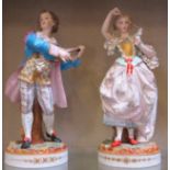 A pair of Continental figures, male and female, the male marked AM in wreath to base, 40cm high