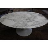 A marble top lamp table and an oval shaped coffee table 1960's style.