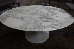 A marble top lamp table and an oval shaped coffee table 1960's style.