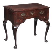 A George III mahogany lowboy, circa 1780, with crossbanded top above one long and two short