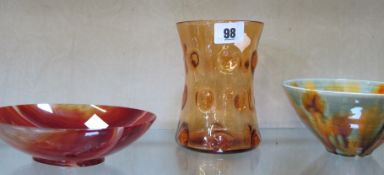 Three 20th Century studio pottery bowls, an amber coloured glass vase and a dish (5)