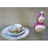 A Dresden cabinet cup and matching saucer, turquoise and floral decorated, a miniature cabinet