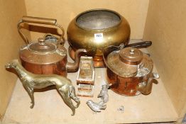 A quantity of assorted metalware to include copper lids, brass weights, horse brasses, flat irons,