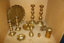 A quantity of assorted brassware, to include two pairs of brass candle sticks etc Best Bid