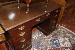 An early 19th century mahogany kneehole desk. 137cm wide x 66cm deep x 82cm high.