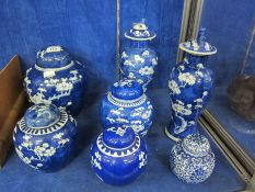 Five blue and white ginger jars with covers, assorted sizes and two similar blue and white