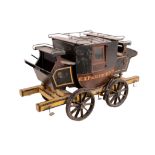 A contemporary model of an early railway carriage, having been developed from a horse drawn