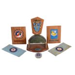Aviation memorabilia : a collection of Royal Air Force Squadron crests mounted on shields, a group