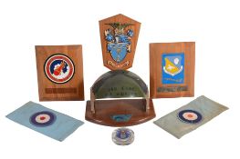 Aviation memorabilia : a collection of Royal Air Force Squadron crests mounted on shields, a group