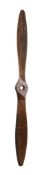 Propeller : an original and unmarked laminated mahogany two blade propeller, the base stamped D9-0