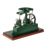 A Stuart Turner model beam engine, having central turned column supporting beam with Watt s