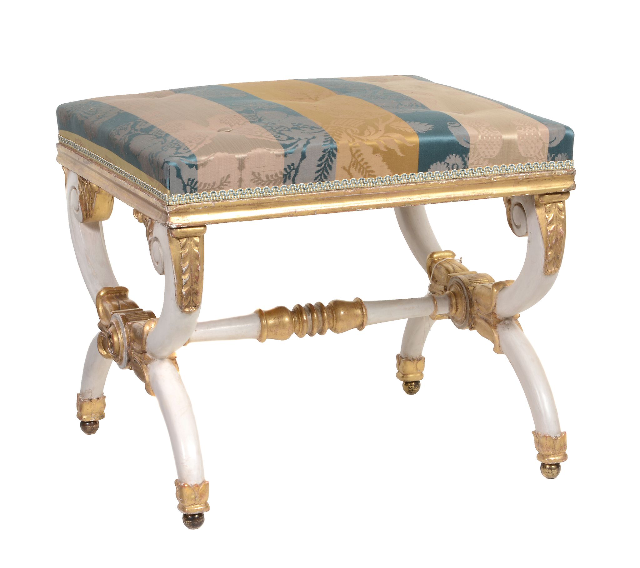 A Regency cream painted and parcel gilt x-frame stool, circa 1815  A Regency cream painted and