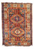 A Persian rug and an Afghan rug 98cm x 148cm, 206cm x 300cm A Persian rug and an Afghan rug 98cm x