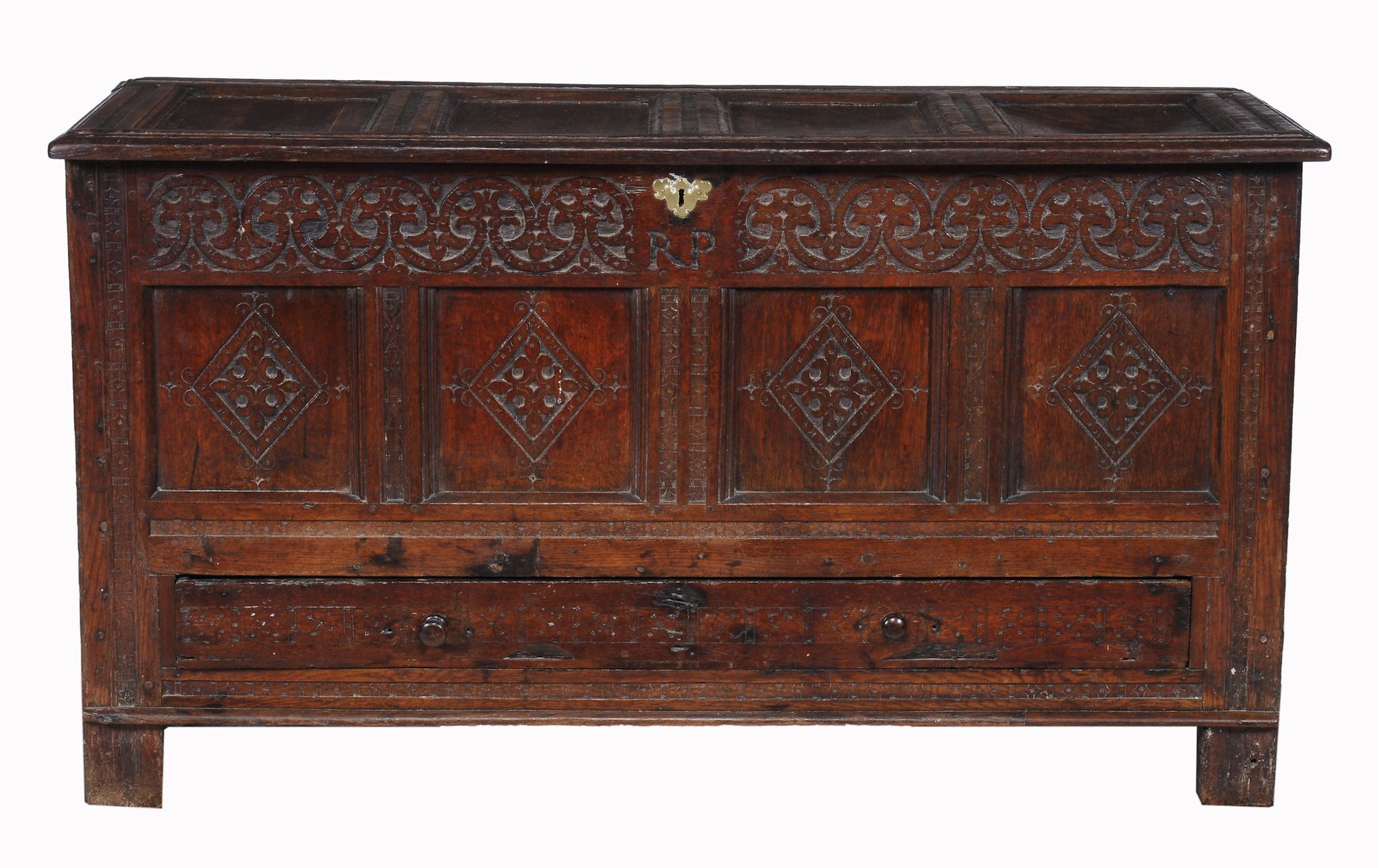 A Charles II oak mule chest , circa 1680, the quadruple panelled lid opening...  A Charles II oak