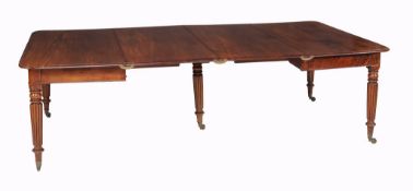 A George IV mahogany extending dining table, circa 1825  A George IV mahogany extending dining