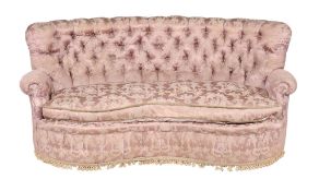A pink damask button back upholstered kidney shaped sofa , early 20th century  A pink damask