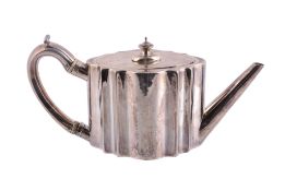 A George III silver shaped oval teapot by Peter Carter,   London 1788, with a finial to the flat