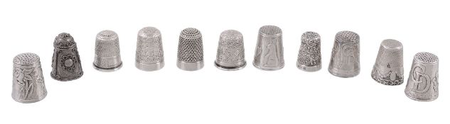 A collection of eleven silver and silver coloured thimbles,   different makers and dates, two