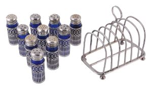 A Victorian six division toast rack,   maker's mark H.W, London 1878, with a loop handle and on