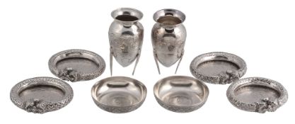 A collection of silver coloured Middle Eastern items,   to include: a pair of vases, engraved with