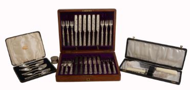 A cased set of twelve Edwardian silver handled knives and forks by Cooper Brothers  &  Sons Ltd.,