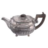 A George III silver oblong baluster tea pot by Robert Hennell I  &  Samuel Hennell,   London 1810,