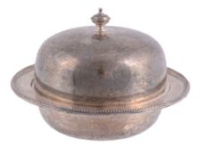 A silver muffin warming dish by Mappin  &  Webb Ltd,   Sheffield 1935, with an orb finial to the