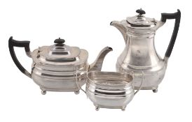 A matched silver oblong baluster part tea service,   comprising: a tea pot and sugar basin by
