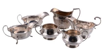 A collection of silver items,   to include: a George III oval cream jug, maker's mark obscured,