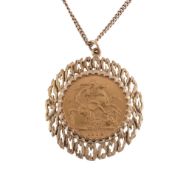 A full sovereign,   1928, in a textured pendant mount, on a curb link chain, stamped 9ct, 61.5cm