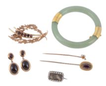 A small collection of jewellery items,   to include: a pair of garnet earrings, the oval shaped
