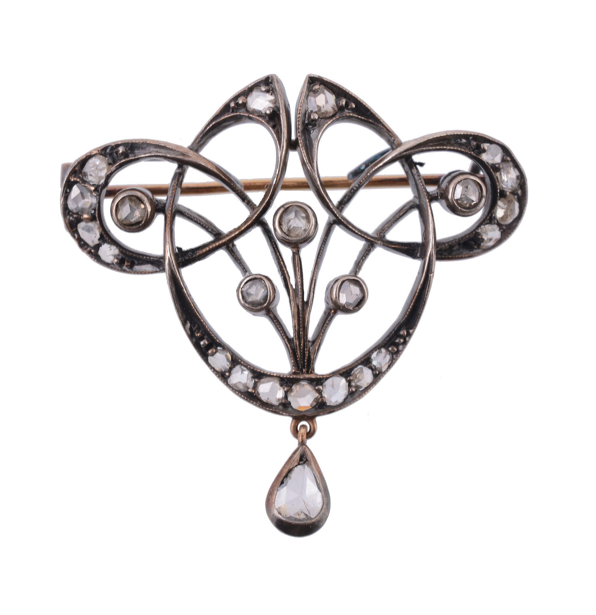 A diamond brooch  , the pierced whiplash style brooch set with rose cut diamonds, 3.8cm long