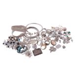A collection of silver coloured jewellery,   to include: fifteen rings; thirteen bracelets;