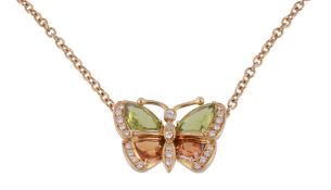 A diamond, peridot and citrine butterfly pendant  , the butterfly with rectangular shaped peridot