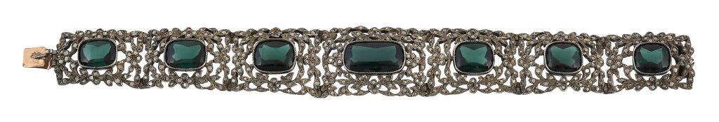 A green tourmaline and diamond bracelet,   the graduated pierced floral panels set with lasque cut