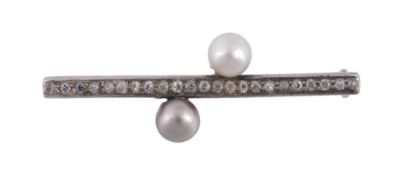 A pearl and diamond brooch,   the bar set with old cut diamonds with a pearl to each side, 4cm long