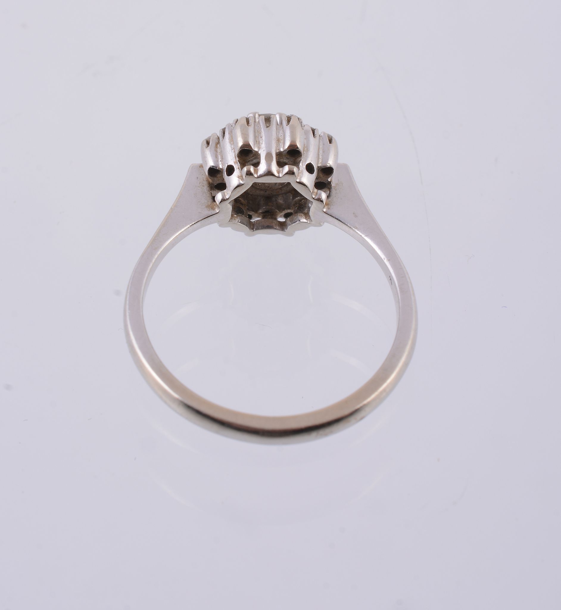 A diamond ring,   the central brilliant cut diamond, estimated to weigh 0.60 carats, claw set - Image 2 of 3