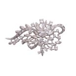 A diamond leaf spray brooch  , circa 1970, the pierced abstract brooch set with brilliant and