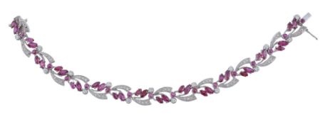 A ruby and diamond bracelet,   the articulated bracelet set with marquise shaped and circular
