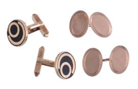 A pair of 9 carat gold and enamel cufflinks,   the circular panels with black enamel detail, with t