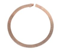 A 9 carat gold necklace,   the collar composed of textured brick links, to a concealed box snap