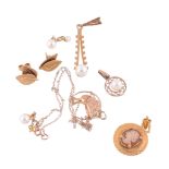 A small collection of gold jewellery,   comprising; a pair of double leaf 9 carat gold earstuds; a