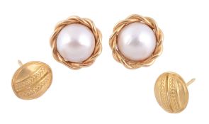 A pair of mabe pearl earrings,   the mabe pearls within a ropetwist border, with London 18 carat