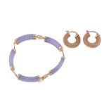 A 14 carat gold lavender jade bracelet,   the curved lavender jade batons with pierced Chinese