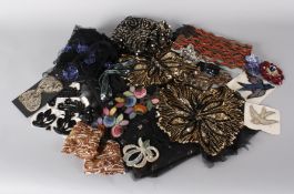 A quantity of early 20th century unused bead and sequin trimmings and motifs; together with larger